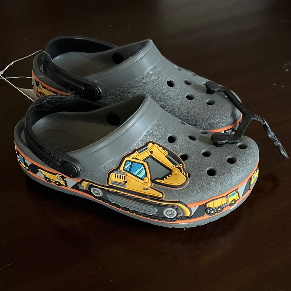 CROCS kids size 12 Gray Clogs with Construction Design